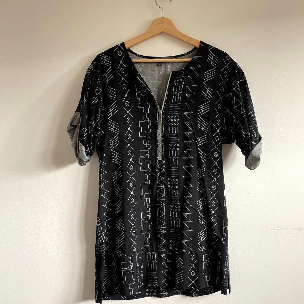 Daryl K Tunic